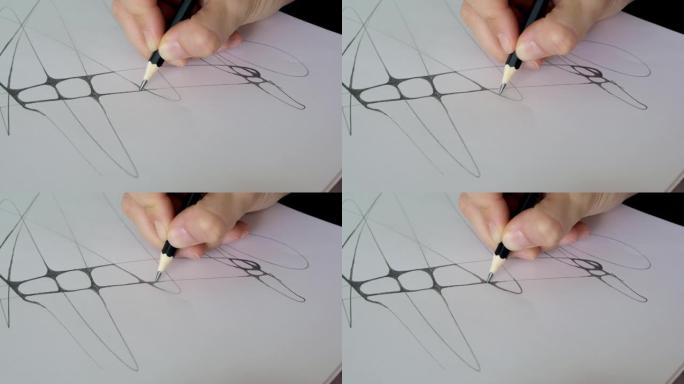 特写灰色铅笔，在纸上画线。用石墨铅笔将边角连接起来，形成神经连接。艺术家在纸上画素描。神经学心理学