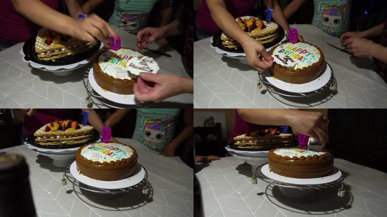 两个圆形心形生日蛋糕的特写镜头，上面有70岁的蜡烛