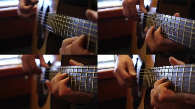 音乐家的手在房间里用电声吉他演奏各种音符的特写镜头