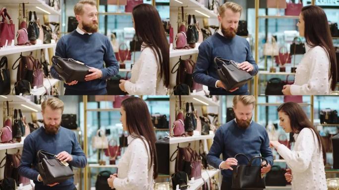 好看的男人客户尝试从配件商店中选择一个包，而漂亮的女售货员则尝试解释有关产品的一些信息。在阿里·阿列