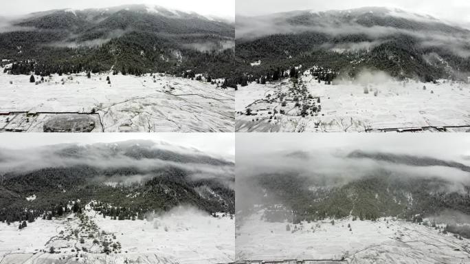 中国风云雾缭绕雪天水墨画古风航拍视频