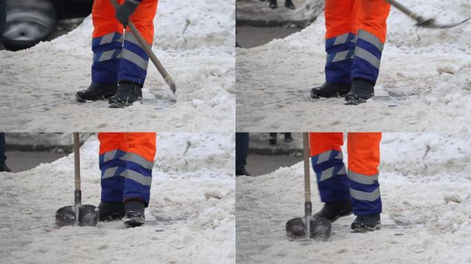 男子，城市除雪服务的公用事业工人，手动铲雪