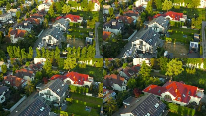 无人机在屋顶上安装了太阳能光伏板系统的新的现代住宅平房中射击。可再生生态绿色能源生产概念。可持续能源