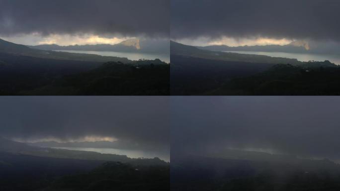 晴天阴雨云巴厘岛著名火山口湖海岸线空中全景4k印度尼西亚