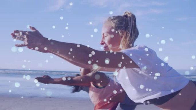 在海滩上练习瑜伽的不同女性朋友上的光点动画