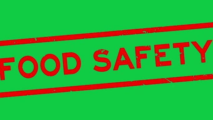 红色垃圾食品安全字方形橡胶印章在绿色背景上缩放