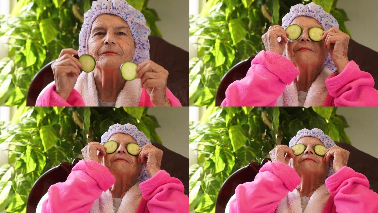 美丽的成年拉丁女人眼睛里拿着黄瓜片