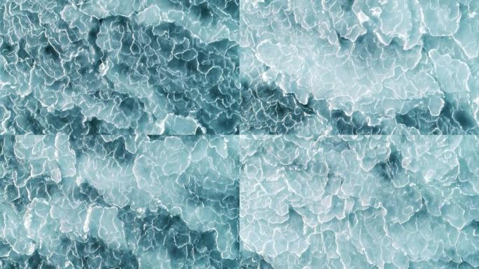 抽象冰面冰冻蓝海的航拍。无人机自上而下。全高清
