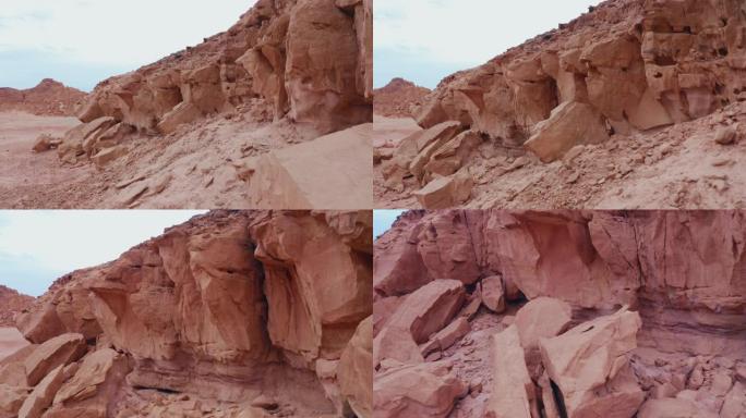 美丽的岩石悬崖在荒芜的红色山谷
