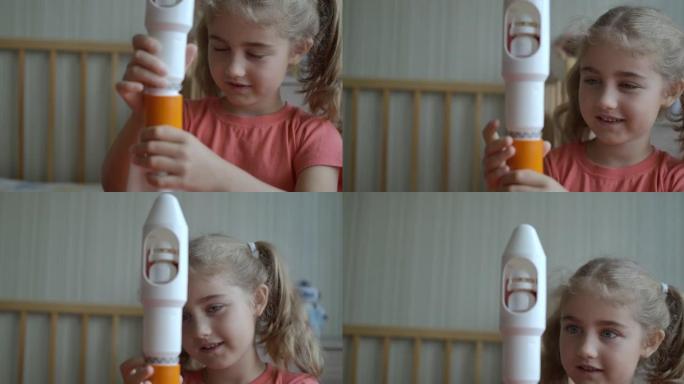 建造火星着陆任务火箭的小女孩。教育科学。创意孩子玩玩具太空火箭。儿童梦想家玩玩具太空火箭。