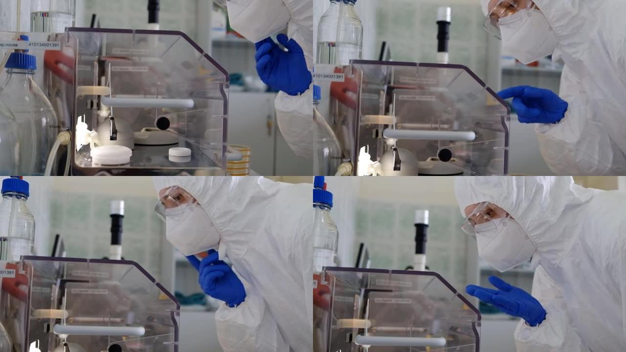 科学家生物学家病毒学家女人看着实验室的实验结果。