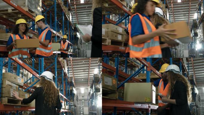 一名经理和工人在工厂储藏室工作和检查库存的4k视频片段