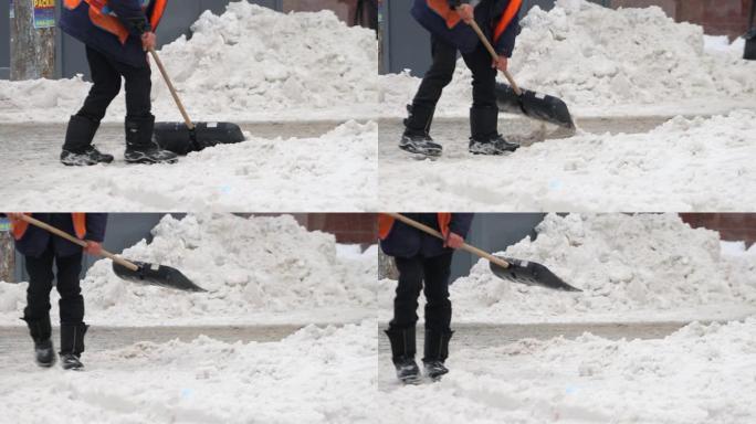 男子，城市除雪服务的公用事业工人，手动铲雪