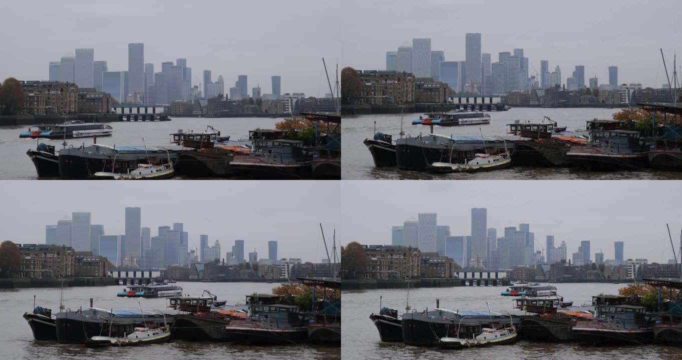 泰晤士河伦敦遥远的金丝雀码头地标摩天大楼全景。