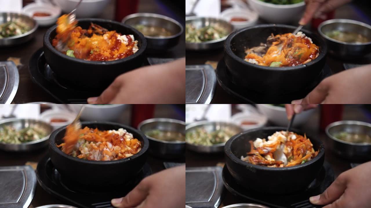韩国料理，韩国米饭拌饭韩国什锦米饭热腾腾的石锅