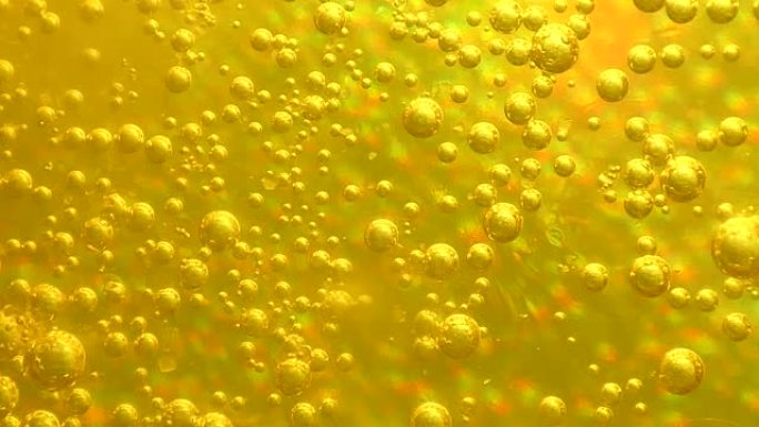 碳酸黄色气泡特写背景