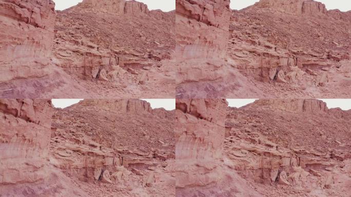 红色沙漠景观中的超现实岩石山