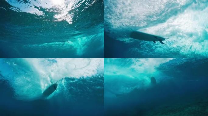 男性冲浪者乘风而入。男子在马尔代夫冲浪完美的蓝浪