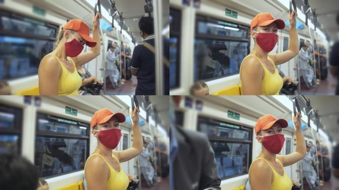 女人戴着防护医用口罩在地面火车上乘坐高加索人。带呼吸器的空中列车上的女孩游客。人们面具
