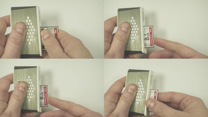 将紧凑型闪存卡插入多卡读卡器中。