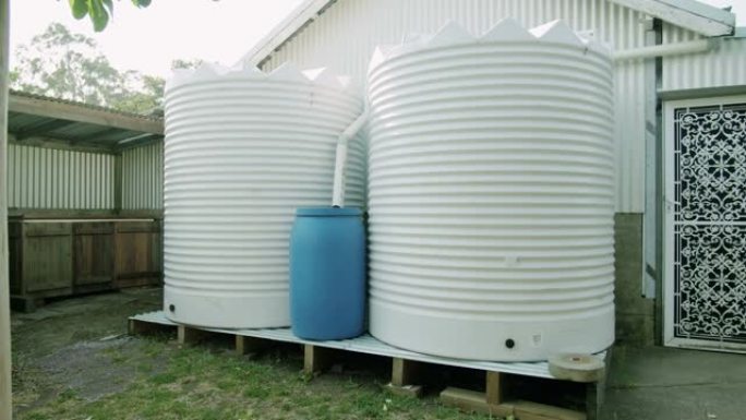 花园库存视频中的水泵和桶