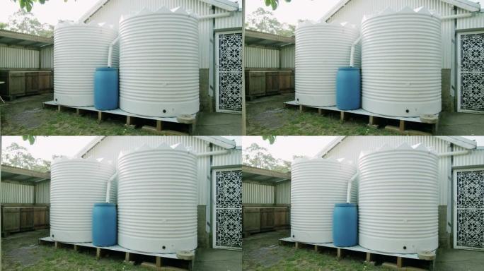 花园库存视频中的水泵和桶