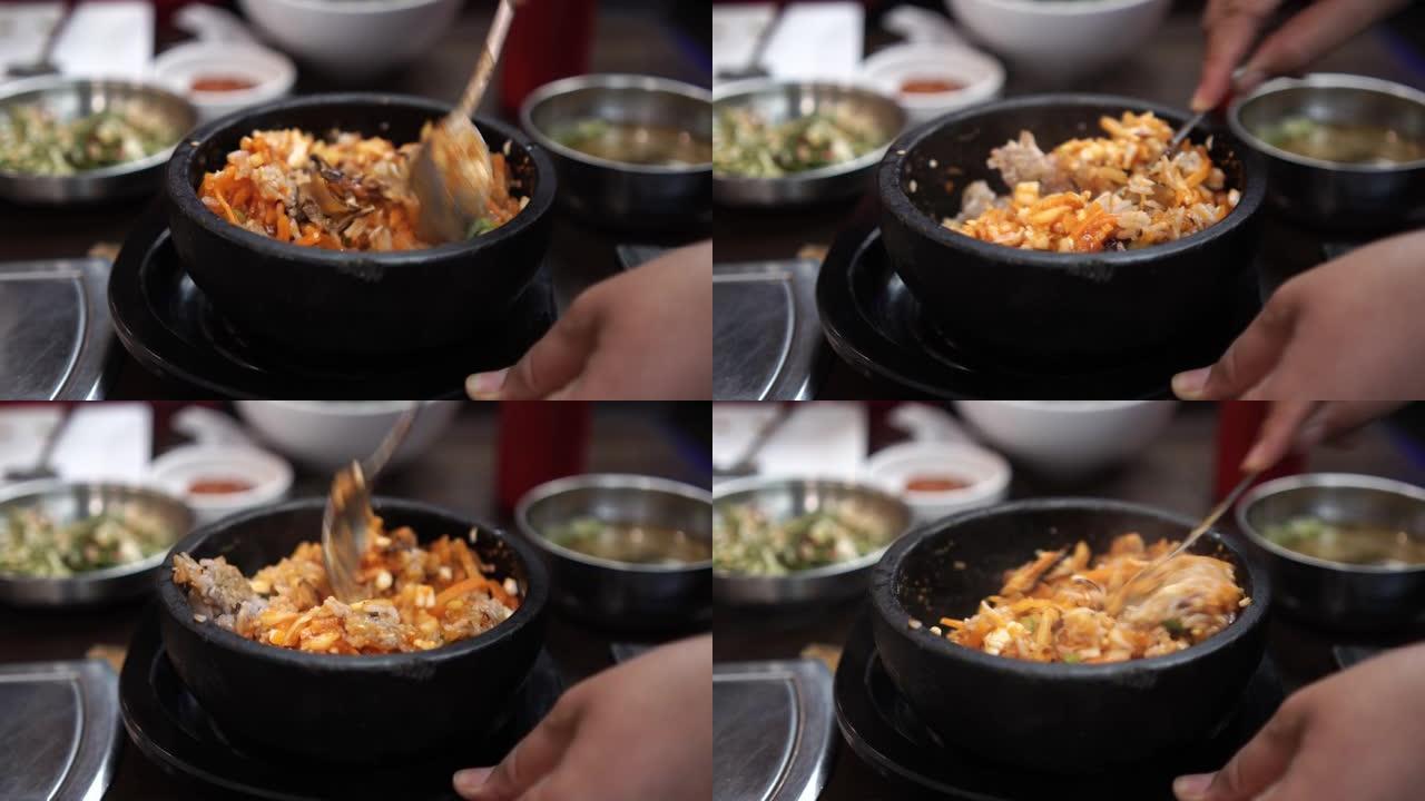 韩国料理，韩国米饭拌饭韩国什锦米饭热腾腾的石锅