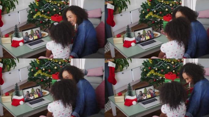 圣诞节期间与家人进行视频通话的非洲裔美国母女快乐