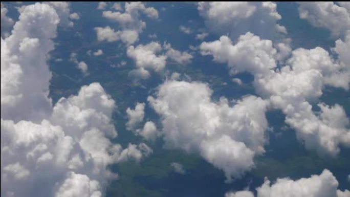 晴天旅行时间飞机窗口蓬松云视点全景4k印度尼西亚
