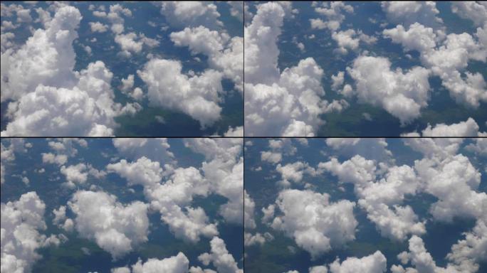 晴天旅行时间飞机窗口蓬松云视点全景4k印度尼西亚