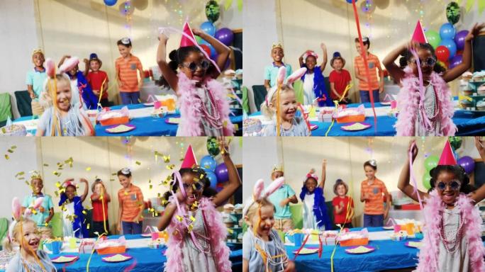 五彩纸屑的动画落在生日聚会上跳舞的不同孩子身上