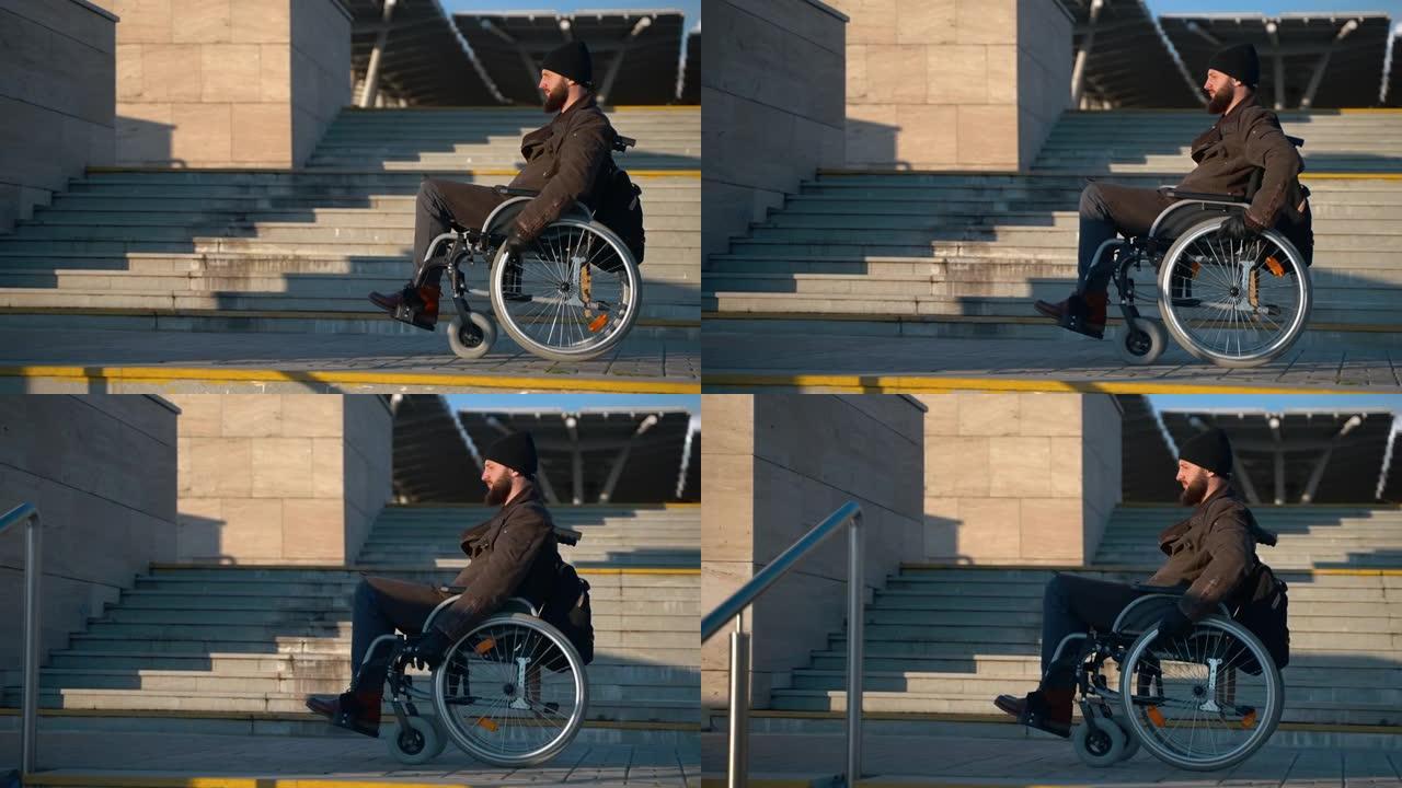 坐在手动轮椅上的男子正在非设备区城市街的楼梯附近移动