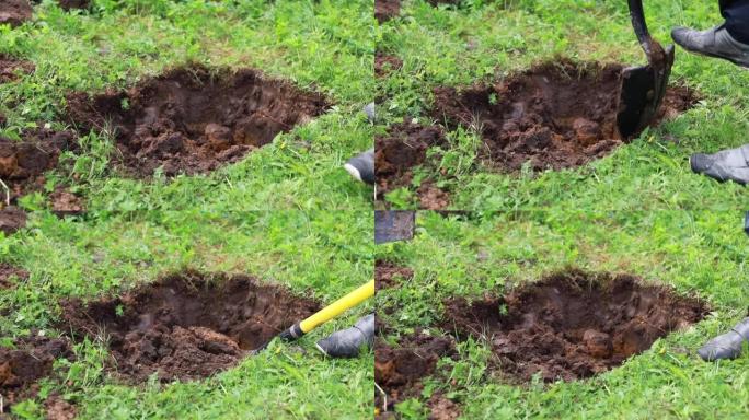 农民挖庄稼床。农夫正在花园里用铲子滴地上。农民的辛勤工作。种植植物，移植树木和灌木