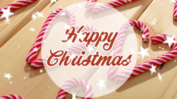 圣诞节快乐的动画在星星坠落和桌上的糖果手杖上