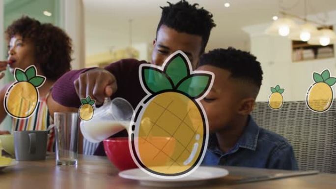 快乐的非洲裔美国父母和儿子在家吃早餐的菠萝动画