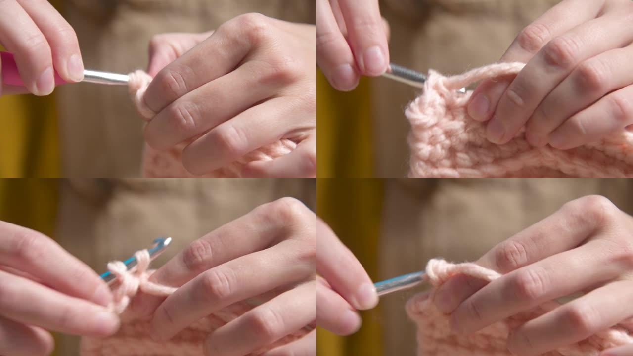 一个高加索女孩做钩针编织的年轻女性手的特写，展示了如何正确编织。浅景深。高动态范围。