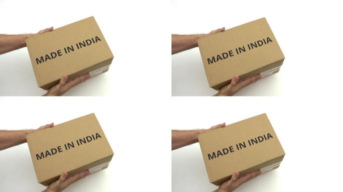 快递员送货纸箱，上面写着印度制造的文字