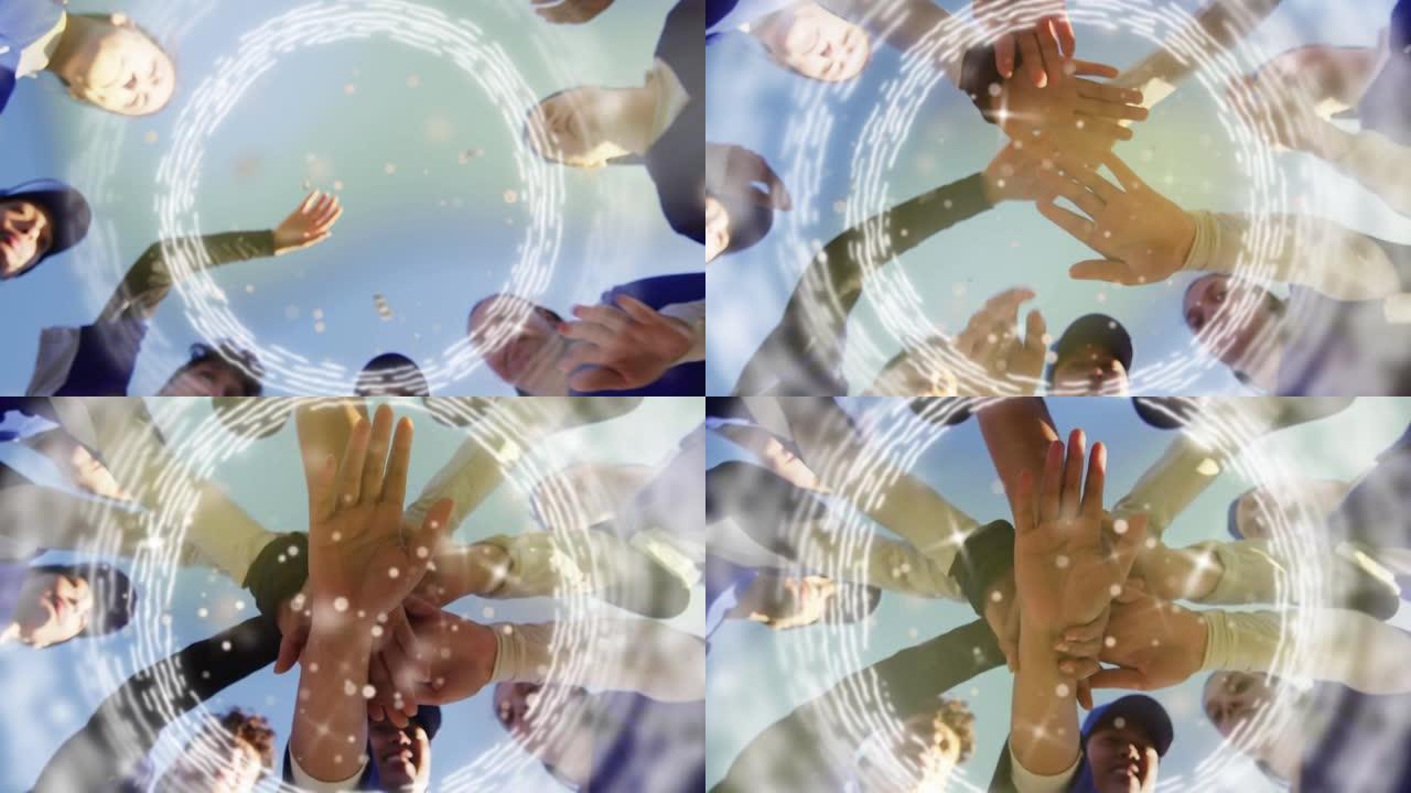 多元化运动队手上的圆圈和光点动画