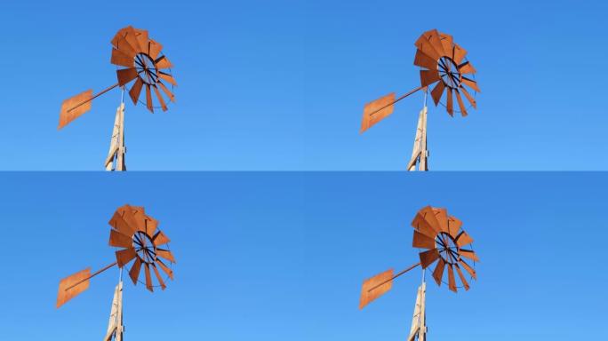风泵的复古风扇在蓝天下快速移动。
