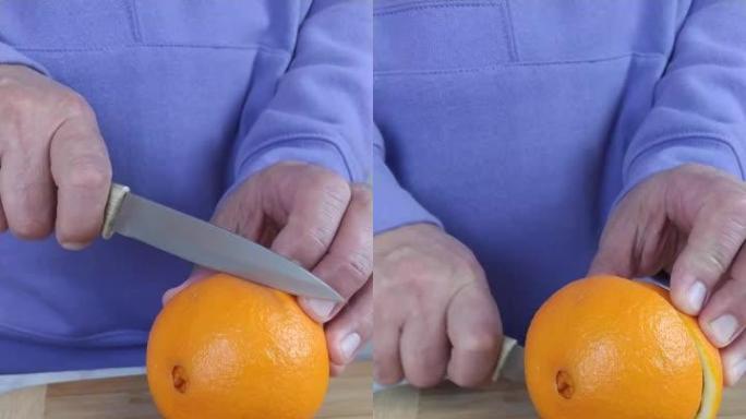 一名男子割伤橘子