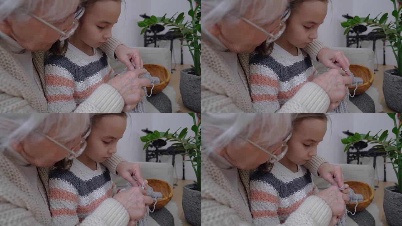 老年妇女教小女孩如何用辐条编织羊毛线