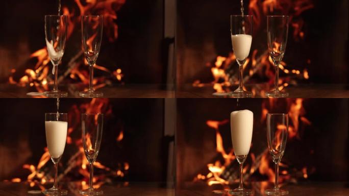 在温暖的壁炉前盛杯起泡的香槟葡萄酒。4k。