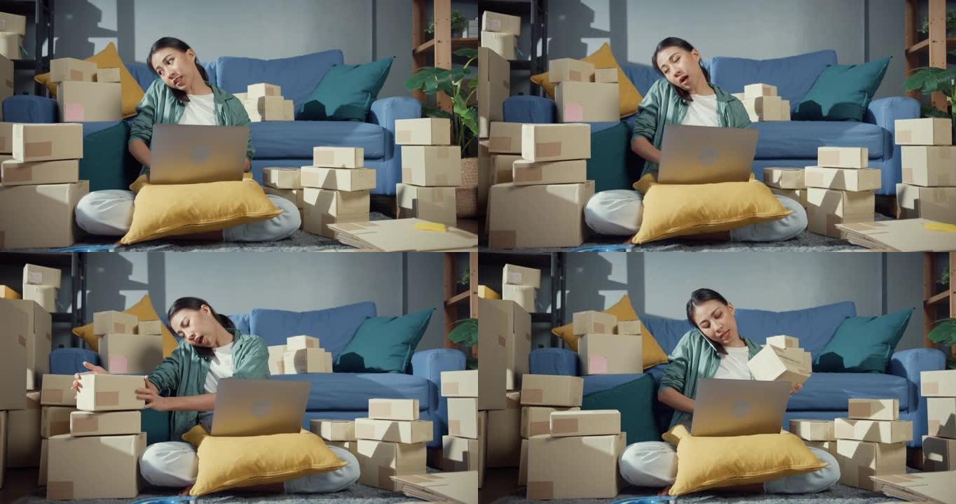 年轻的亚洲女性卖家在线商店在手机上聊天,并在家里订购发货给客户。