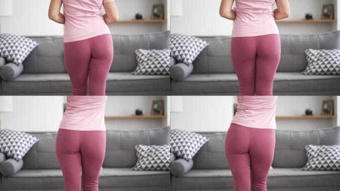 完美的粉色打底裤女性臀部