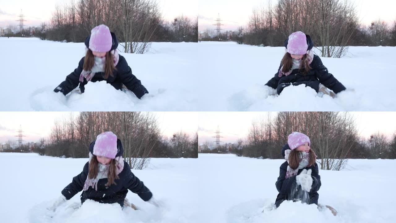 小可爱女孩玩雪，玩得开心。儿童冬季游戏假期概念