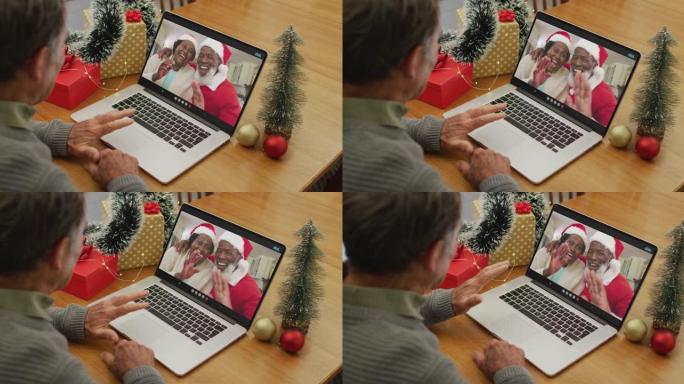 圣诞节期间，白人高级男子与seniio朋友进行视频通话