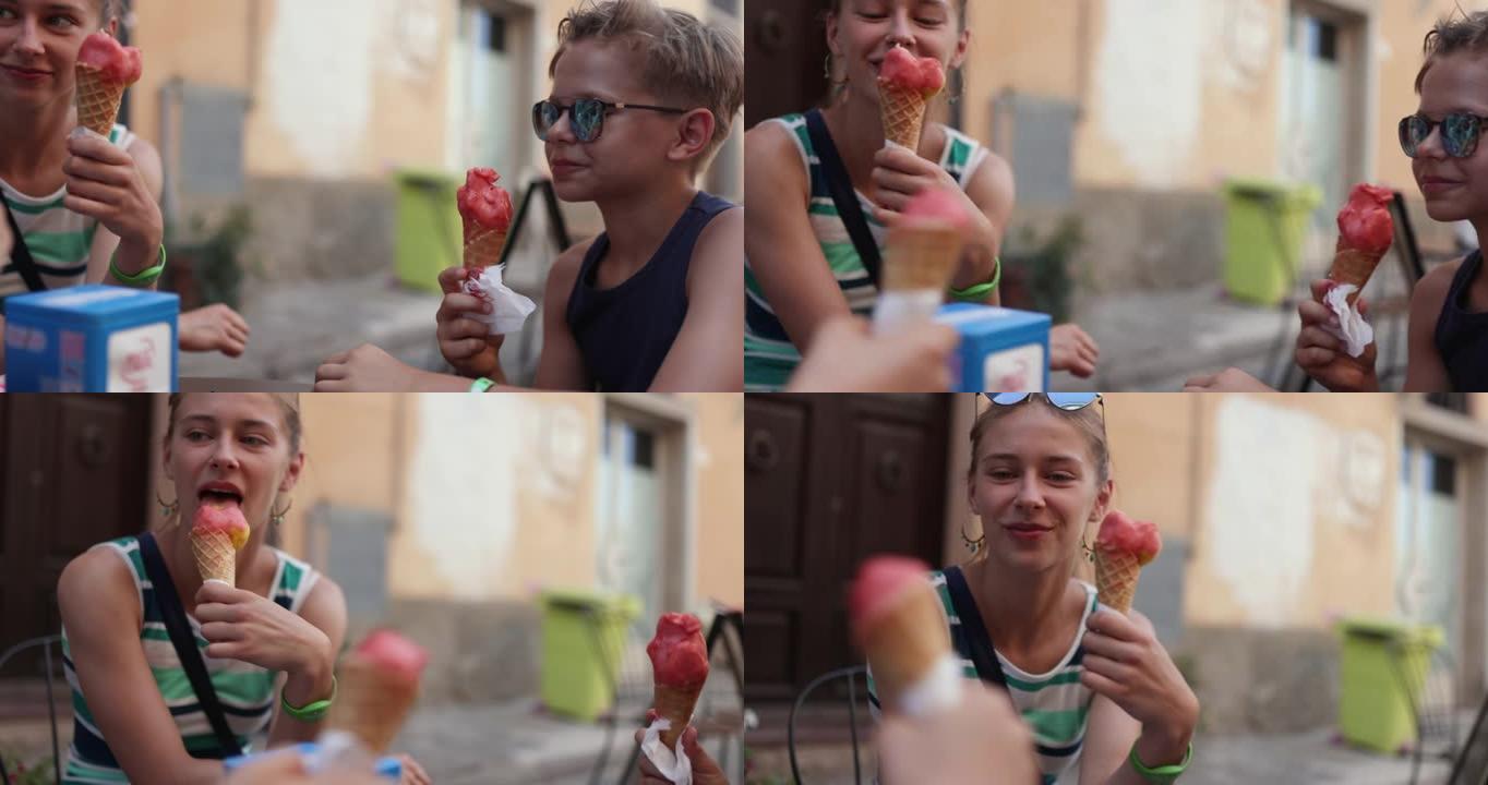 家庭在小镇上吃意大利自制冰淇淋