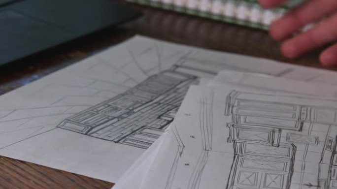 工程师在完成的现代公寓中制定新的厨房内部图纸计划