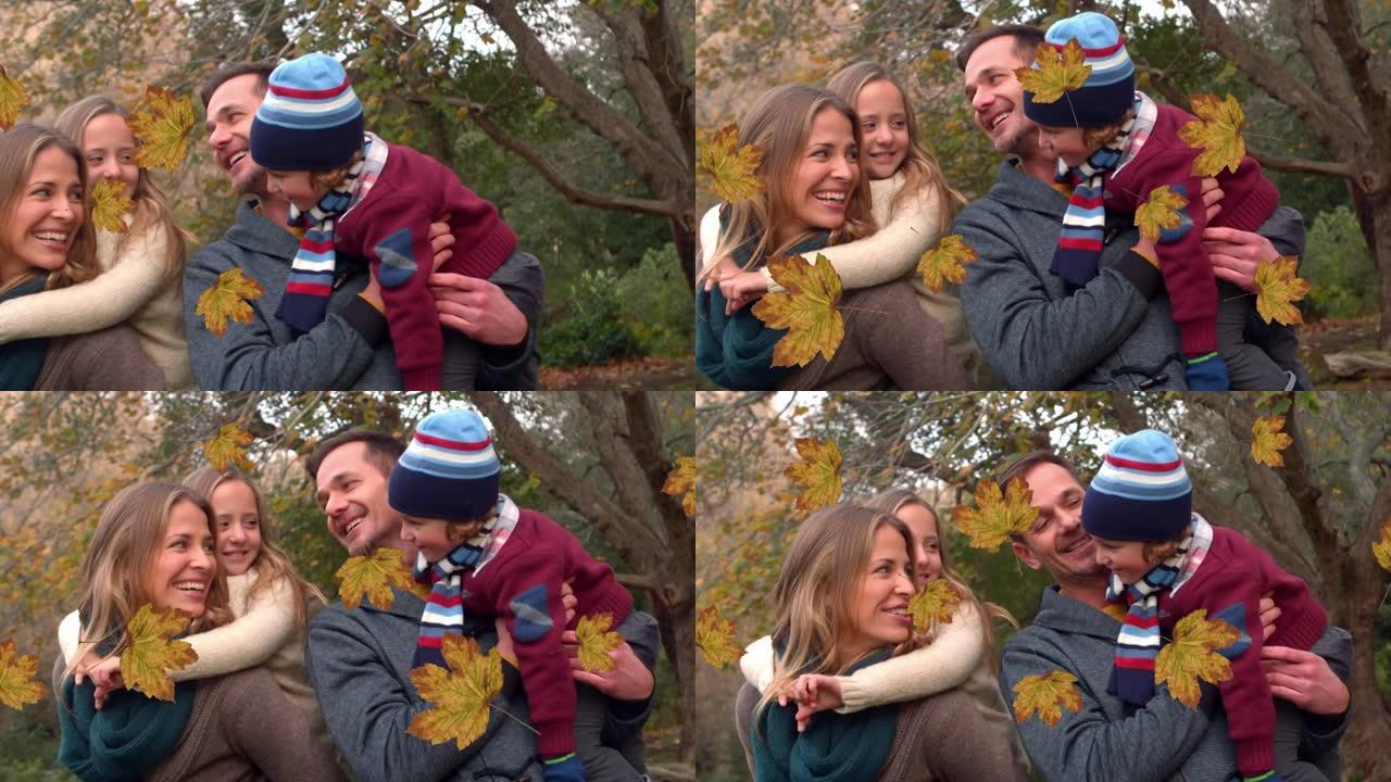 秋叶落在公园快乐的高加索家庭上的动画