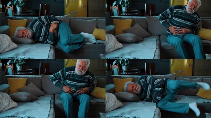 退休老人躺在沙发上，肚子疼。